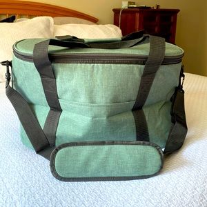 Brand new insulated cooler; green; shoulder strap and carrying handle
